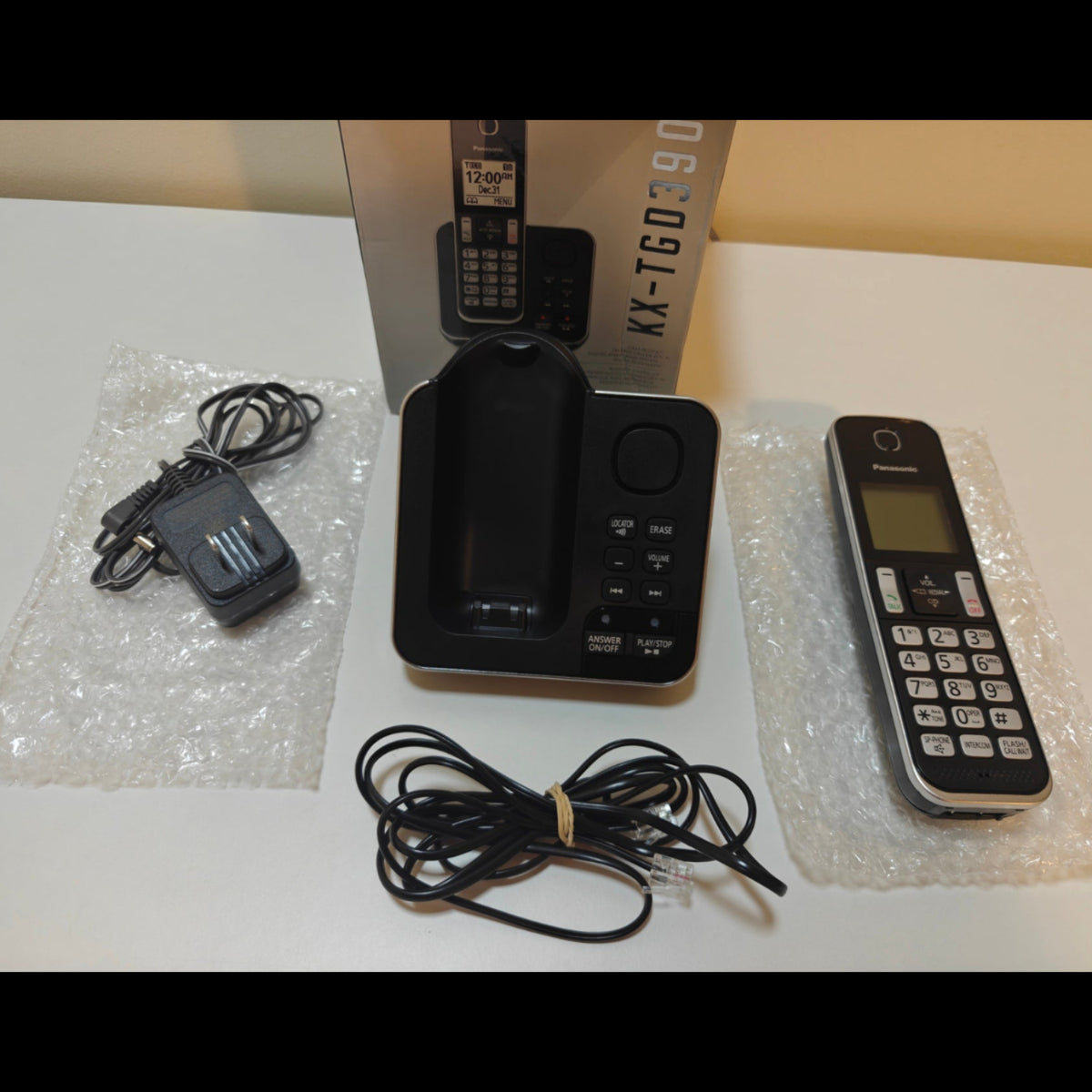 H16 - Panasonic DECT 6.0 Expandable Cordless Phone with Answering Machine and Call Block - 1 Cordless Handset - KX-TGD390CB
