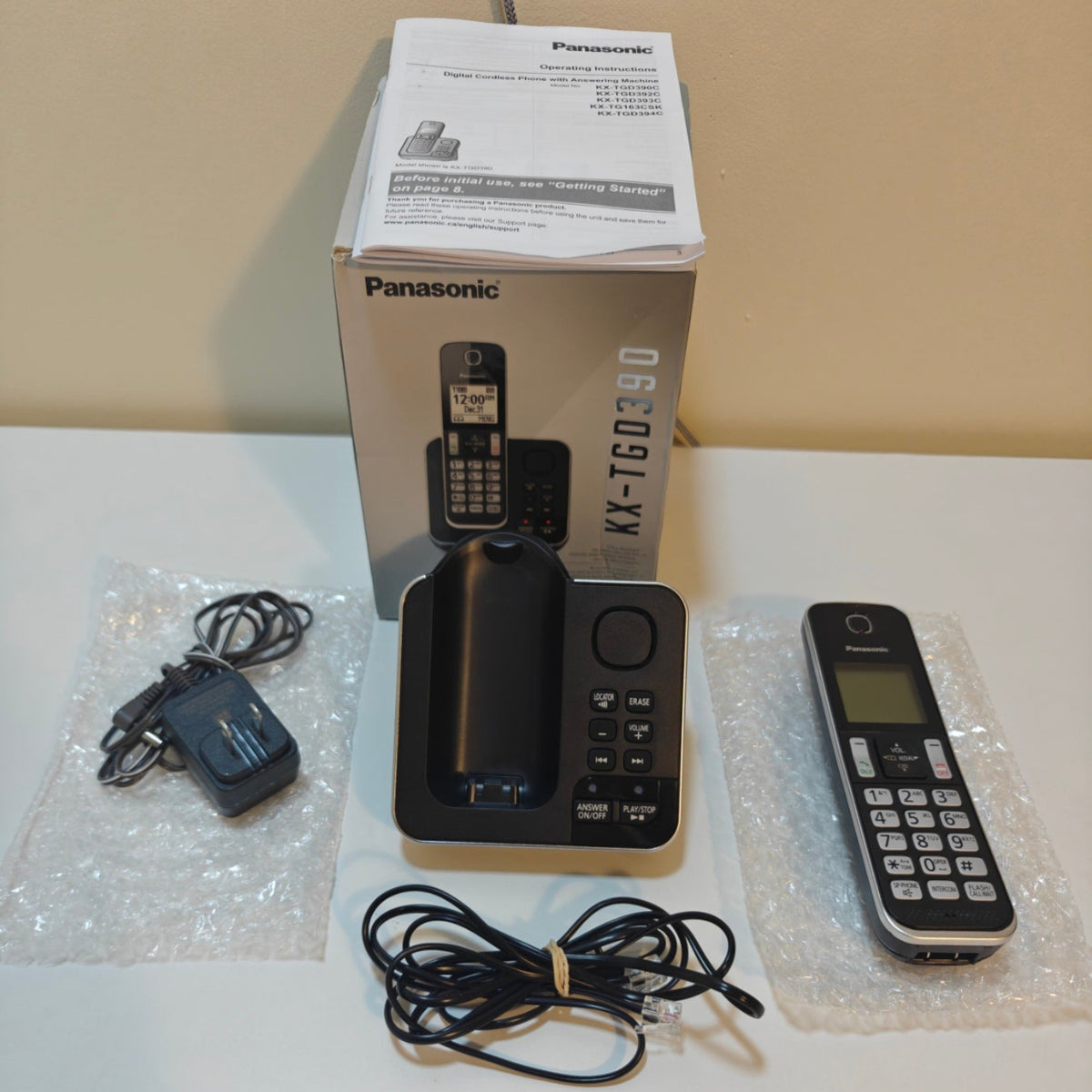 H16 - Panasonic DECT 6.0 Expandable Cordless Phone with Answering Machine and Call Block - 1 Cordless Handset - KX-TGD390CB